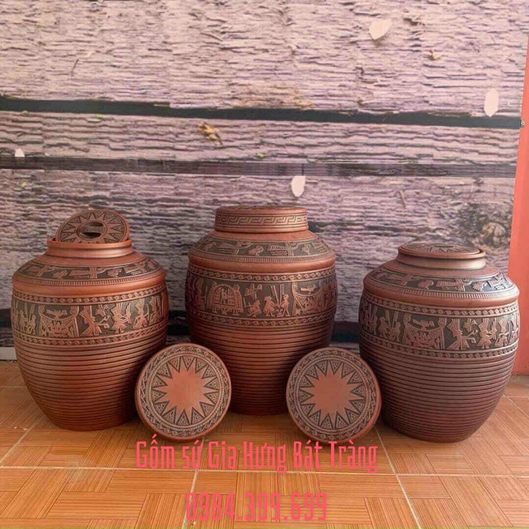 chum sành trống đồng âu lạc chum sành, chum rượu, chum ngâm rượu, chum sành đông sơn âu lạc, bình ngâm rượu, chum đựng rượu, chum sành ngâm rượu, chum sành đựng rượu, chum rượu bát tràng, chum 10l, chum 20l, chum 20l, chum rượu 50l, chum sành trống đồng, chum sành khắc nổi
