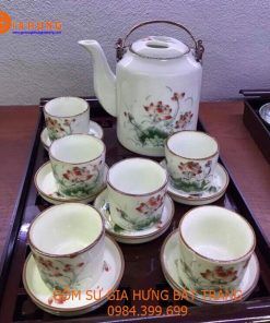 Bộ ấm chén bát tràng, bộ ấm chén vại. bộ ấm chén khắc hoa văn, bộ ấm tích men lam bát tràng, ấm tích 1.5l, ấm tích bát tràng 1,5l, bộ ấm tích men kem vẽ sen xanh, ấm tích vẽ đào